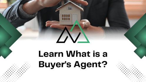 Person in a suit holding a model house, representing real estate insights for buyers in Alberta by New Homes Alberta.