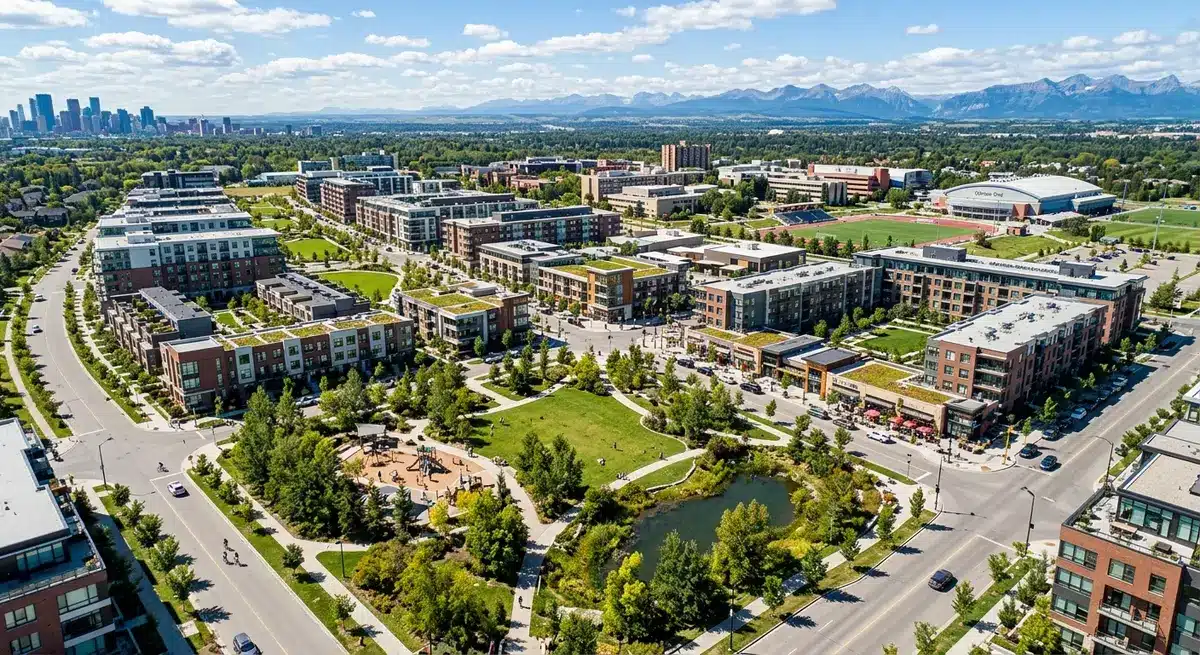 Aerial view of the University District Calgary master-planned community showcasing green spaces and modern architecture